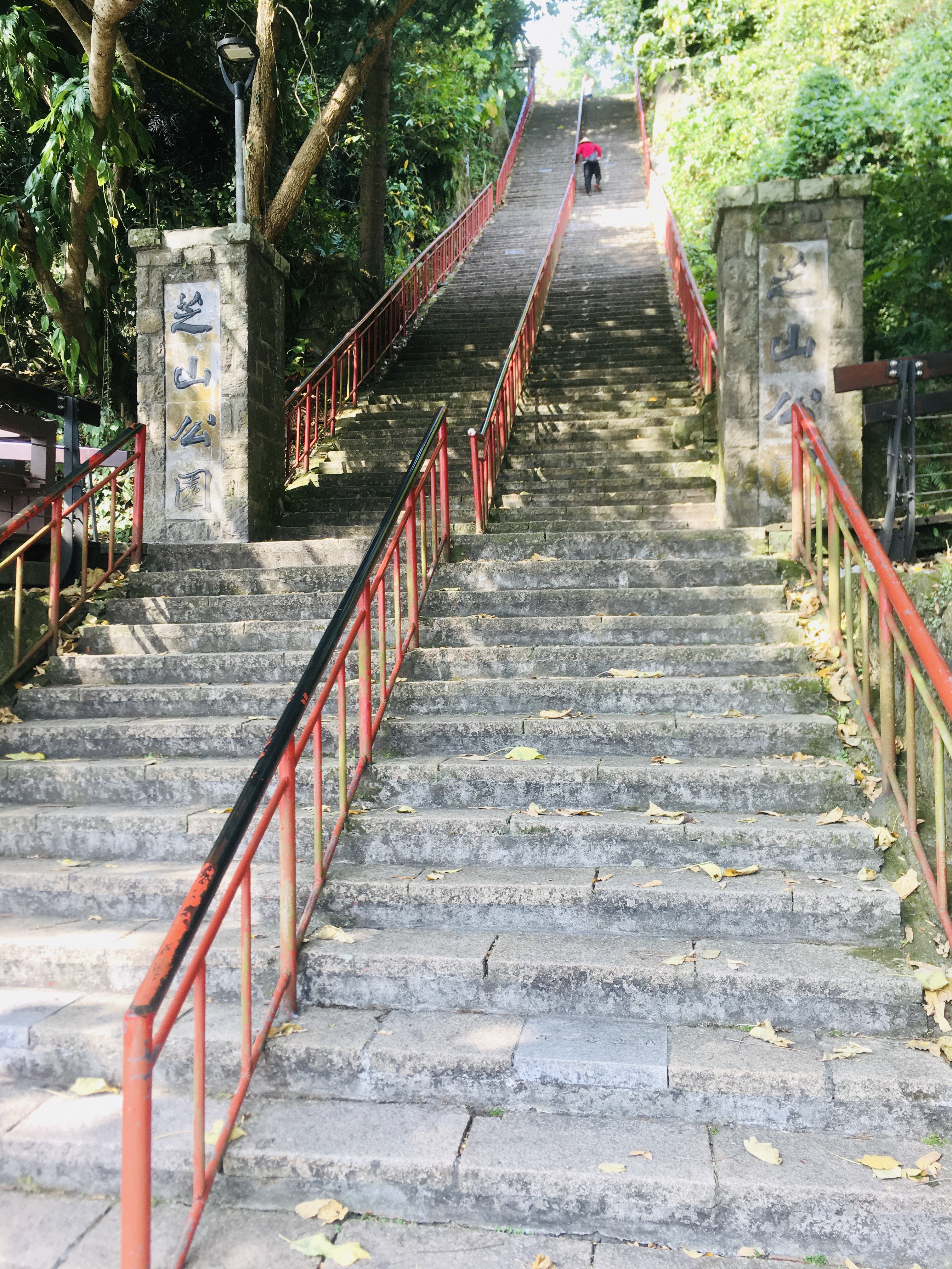 Old stone staircase with red railings, Taipei